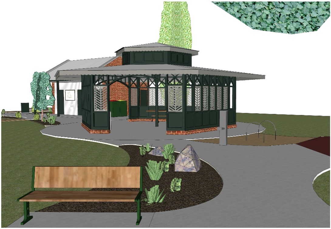 Connecting path between the playground and Rotunda. Bicycle hoops and accessible drink fountaion with dog bowl line the path. Stepless pathway leads to shaded table and bench seating.